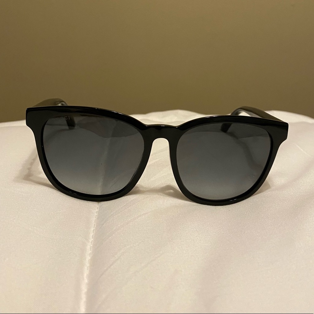 Gucci sunglasses with stars and bees.